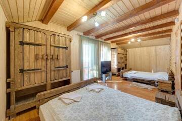 Фото номера Коттедж с 3 спальнями Курортные отели Mini Hotel Laplandiya г. Буковель 15