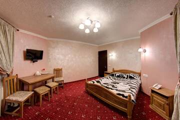 Фото номера Семейный номер Отель Горный Кристал г. Буковель 2