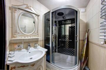 Фото номера Апартаменты с 2 спальнями Отель Горный Кристал г. Буковель 6