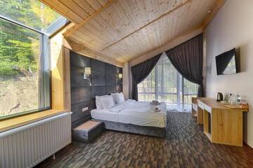 Фото номера Улучшенный полулюкс Отель Karpatski Hotel &amp; Spa г. Буковель 5