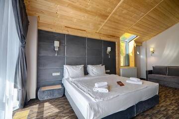 Фото номера Улучшенный полулюкс Отель Karpatski Hotel &amp; Spa г. Буковель 10