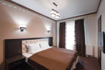 Фото номера Стандартный двухместный номер с 1 кроватью Отель Karpatski Hotel &amp; Spa г. Буковель 2