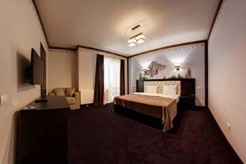 Фото номера Полулюкс Отель Karpatski Hotel &amp; Spa г. Буковель 2