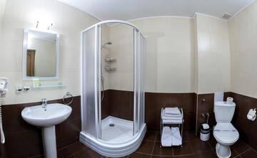 Фото номера Полулюкс с балконом Отель Home Hotel г. Буковель 12