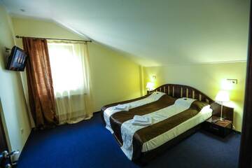 Фото номера Полулюкс Отель Home Hotel г. Буковель 2