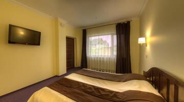 Фото номера Полулюкс с балконом Отель Home Hotel г. Буковель 7