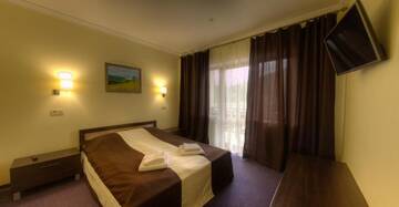 Фото номера Полулюкс с балконом Отель Home Hotel г. Буковель 5