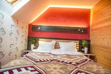 Фото номера Люкс в мансарде Отель F&amp;B Spa Resort (ex. Fomich Hotel) г. Буковель 3