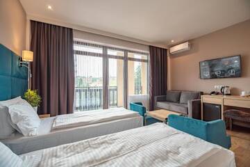 Фото номера Четырехместный номер Делюкс Отель F&amp;B Spa Resort (ex. Fomich Hotel) г. Буковель 5