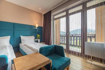 Фото номера Четырехместный номер Делюкс Отель F&amp;B Spa Resort (ex. Fomich Hotel) г. Буковель 7