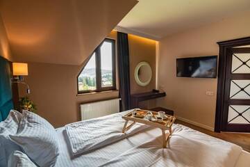 Фото номера Семейный номер Делюкс Отель F&amp;B Spa Resort (ex. Fomich Hotel) г. Буковель 20
