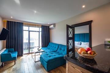 Фото номера Семейный номер Делюкс Отель F&amp;B Spa Resort (ex. Fomich Hotel) г. Буковель 24