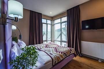 Фото номера Семейный номер Делюкс Отель F&amp;B Spa Resort (ex. Fomich Hotel) г. Буковель 2