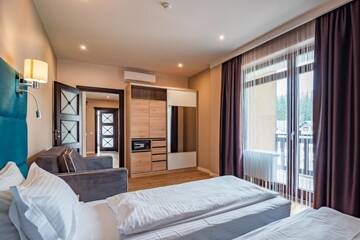 Фото номера Четырехместный номер Делюкс Отель F&amp;B Spa Resort (ex. Fomich Hotel) г. Буковель 12