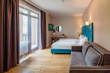 Фото номера Четырехместный номер Делюкс Отель F&amp;B Spa Resort (ex. Fomich Hotel) г. Буковель 13