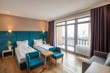 Фото номера Четырехместный номер Делюкс Отель F&amp;B Spa Resort (ex. Fomich Hotel) г. Буковель 9