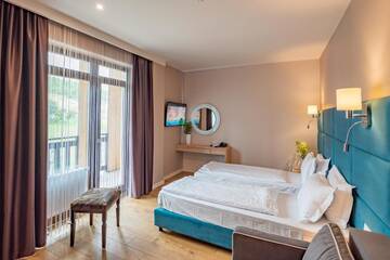 Фото номера Четырехместный номер Делюкс Отель F&amp;B Spa Resort (ex. Fomich Hotel) г. Буковель 11