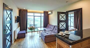 Фото номера Семейный номер Делюкс Отель F&amp;B Spa Resort (ex. Fomich Hotel) г. Буковель 9