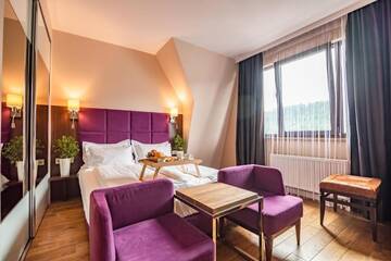 Фото номера Семейный номер с видом на горы Отель F&amp;B Spa Resort (ex. Fomich Hotel) г. Буковель 5