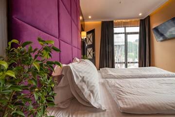 Фото номера Семейный номер с видом на горы Отель F&amp;B Spa Resort (ex. Fomich Hotel) г. Буковель 11