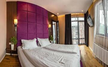 Фото номера Семейный номер с видом на горы Отель F&amp;B Spa Resort (ex. Fomich Hotel) г. Буковель 13