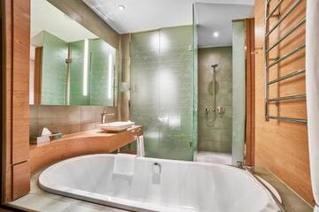 Фото номера Номер «Премиум» Курортные отели Radisson Blu Resort Bukovel г. Буковель 2