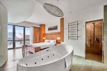 Фото номера Спа-люкс с террасой Курортные отели Radisson Blu Resort Bukovel г. Буковель 3