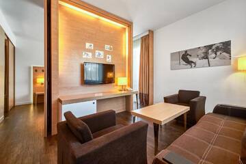 Фото номера Полулюкс Курортные отели Radisson Blu Resort Bukovel г. Буковель 4