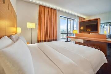 Фото номера Семейный номер Курортные отели Radisson Blu Resort Bukovel г. Буковель 2