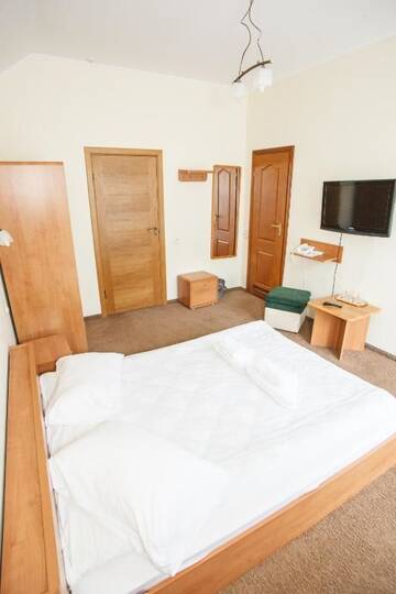 Фото номера Стандартный двухместный номер с 1 кроватью Отель Hotel Skilandhouse г. Буковель 6