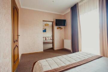 Фото номера Семейный люкс - Включен вход в спа-центр Отель Hotel Bellavista &amp; Spa г. Буковель 12