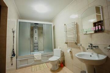 Фото номера Семейный люкс - Включен вход в спа-центр Отель Hotel Bellavista &amp; Spa г. Буковель 18