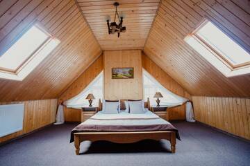 Фото номера Люкс в мансарде - В стоимость входит доступ в спа-центр Отель Hotel Bellavista &amp; Spa г. Буковель 7