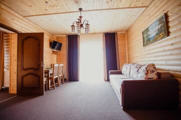 Фото номера Семейный люкс - Включен вход в спа-центр Отель Hotel Bellavista &amp; Spa г. Буковель 2