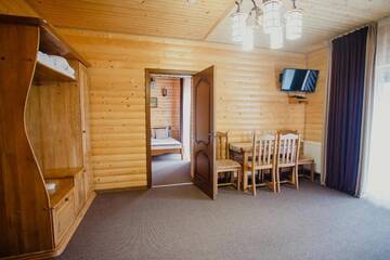 Фото номера Семейный люкс - Включен вход в спа-центр Отель Hotel Bellavista &amp; Spa г. Буковель 9