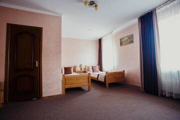 Фото номера Просторный двухместный номер с 2 отдельными кроватями Отель Hotel Bellavista &amp; Spa г. Буковель 3