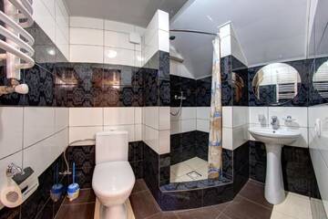 Фото номера Четырехместный номер в мансарде Отель Villa Anet г. Буковель 7