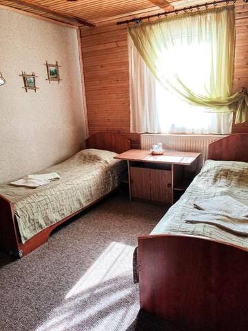 Фото номера Стандартный двухместный номер с 2 отдельными кроватями Отель Синяя Гора г. Буковель 2
