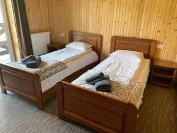 Фото номера Стандартный двухместный номер с 2 отдельными кроватями Отель Villa Loiza г. Буковель 7