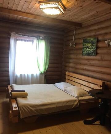 Фото номера Коттедж с 6 спальнями Дома для отпуска Cottage Kalina г. Буковель 73