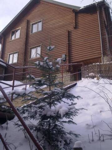 Фото номера Коттедж с 6 спальнями Дома для отпуска Cottage Kalina г. Буковель 48