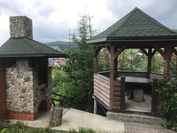 Фото номера Коттедж с 6 спальнями Дома для отпуска Cottage Kalina г. Буковель 57