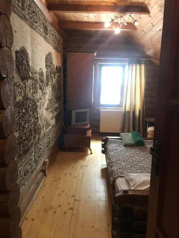 Фото номера Коттедж с 6 спальнями Дома для отпуска Cottage Kalina г. Буковель 28