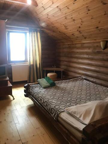 Фото номера Коттедж с 6 спальнями Дома для отпуска Cottage Kalina г. Буковель 27