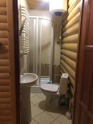Фото номера Коттедж с 6 спальнями Дома для отпуска Cottage Kalina г. Буковель 35