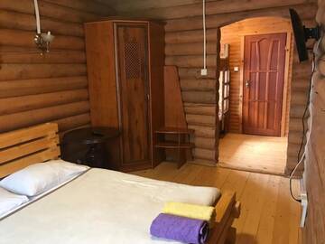Фото номера Коттедж с 6 спальнями Дома для отпуска Cottage Kalina г. Буковель 36