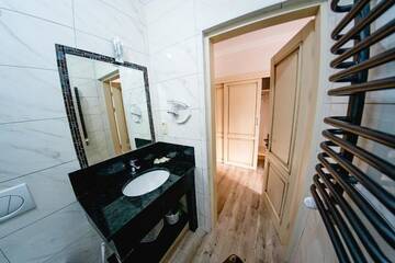 Фото номера Семейный люкс - Включен вход в спа-центр Отель Villa Leku SPA Resort г. Буковель 5