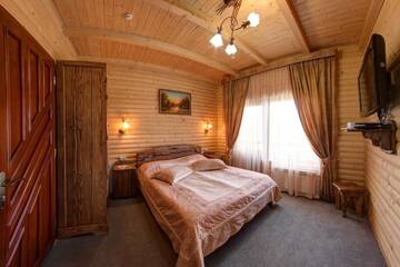 Фото номера Коттедж с 3 спальнями Курортные отели Hotel Podgorie Spa г. Буковель 2