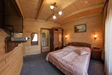 Фото номера Коттедж с 3 спальнями Курортные отели Hotel Podgorie Spa г. Буковель 5