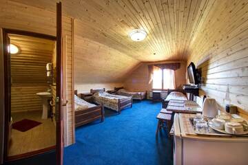 Фото номера Четырехместный номер Курортные отели Hotel Podgorie Spa г. Буковель 6